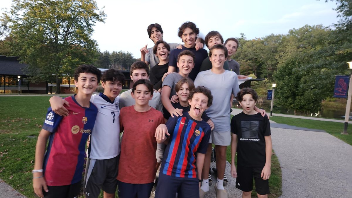 Representatives of "Los Caballeros" (The Gentlemen), Eaglebrook's Spanish-speaking affinity group, assemble on Gates Quad for a group photo.