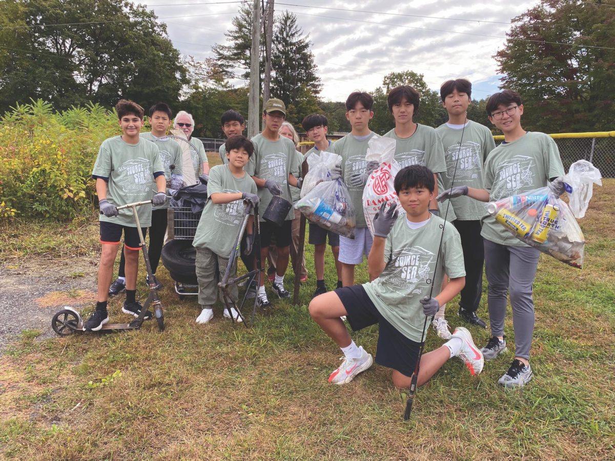 On a recent weekend, Sustainability Club members cleaned up the banks of the Deerfield River, finding an old tire, a scooter, and a lot of cans.