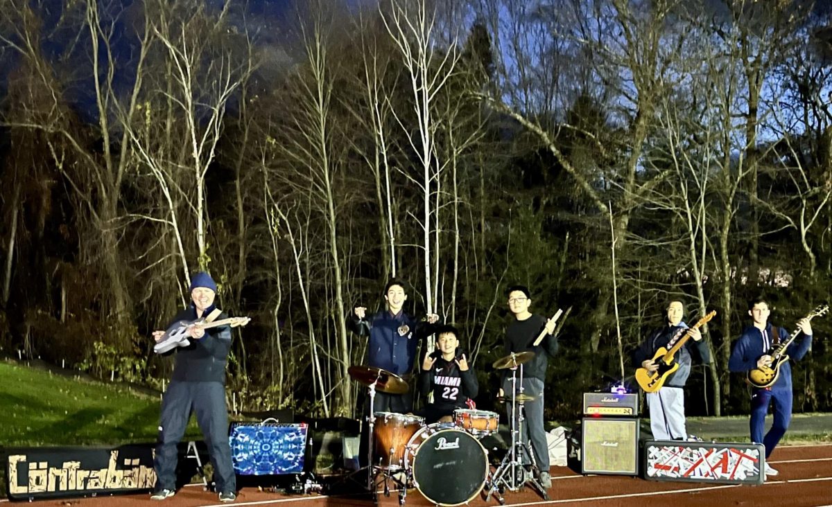 Mr. Townsend and the band rock out on the sidelines of the first Friday night football game.